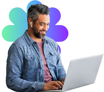 man on laptop with branded graphical element in background
